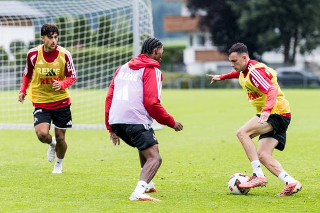 ST. JOHANN IN TIROL, AUSTRIA - JULY 26: Paul Okon-Engstler (1. FC Koeln, 23) contorls the ball against Reigan Heskey (1. FC Koeln, 11) during a training session at trainings camp in Kitzbuehel of season 2026 27 at Koasastadion on July 26, 2026 in St. Johann in Tirol, Austria. Austria Copyright: xSteffiexWunderlx