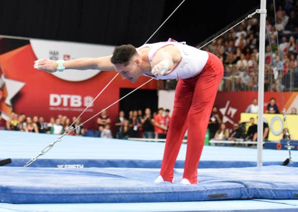 26.07.2026, xhbx, Turnen DM Finals 2026, Gerätfinals Männer v.l. Andreas Toba Reck (DFL DFB REGULATIONS PROHIBIT ANY USE OF PHOTOGRAPHS as IMAGE SEQUENCES and or QUASI-VIDEO) Hannover *** July 26, 2026, xhbx, 2026 German Gymnastics Championships Finals, Men s Apparatus Finals, from left: Andreas Toba, High Bar. DFL and DFB regulations prohibit any use of photographs as image sequences and or quasi-video. Hanover