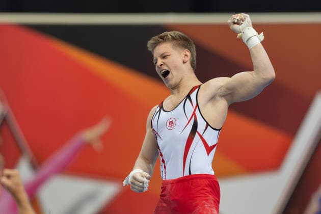 Deutsche Meisterschaften im Gerätturnen 2026, Gerätfinals Gabriel Eichhorn (MTV Stuttgart) jubelt nach seiner Übung am Reck. Deutsche Meisterschaften im Gerätturnen, Gerätfinals, am 26. Juli 2026 in der ZAG-Arena in Hannover., Hannover Niedersachsen Deutschland ZAG Arena *** 2026 German Artistic Gymnastics Championships, Apparatus Finals: Gabriel Eichhorn of MTV Stuttgart celebrates after his routine on the high bar. German Artistic Gymnastics Championships, Apparatus Finals, on July 26, 2026, at the ZAG Arena in Hanover, Hanover, Lower Saxony, Germany. ZAG Arena