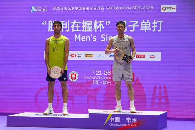 (260726) -- CHANGZHOU, July 26, 2026 -- Gold medalist Chou Tien Chen (R) and silver medalist Toma Junior Popov pose on the podium during the awarding ceremony after the men s singles final match between Chou Tien Chen of Chinese Taipei and Toma Junior Popov of France at the China Open 2026 badminton tournament in Changzhou, east China s Jiangsu Province, July 26, 2026. ) (SP)CHINA-CHANGZHOU-BADMINTON-CHINA OPEN-MEN S SINGLES-FINAL(CN) LixBo 