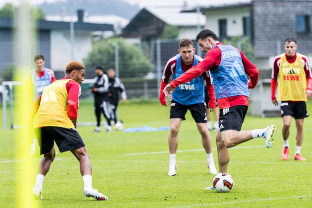 ST. JOHANN IN TIROL, AUSTRIA - JULY 26: Luka Lochoshvili (1. FC Koeln, 24) controls the ball against Maik Nelson Afri Akumu (1. FC Koeln, 35) during a training session at trainings camp in Kitzbuehel of season 2026 27 at Koasastadion on July 26, 2026 in St. Johann in Tirol, Austria. Austria Copyright: xSteffiexWunderlx