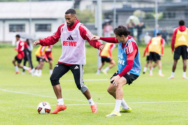 ST. JOHANN IN TIROL, AUSTRIA - JULY 26: Linton Maina (1. FC Koeln, 37) controls the ball against Alessio Castro-Montes (1. FC Koeln, 17) during a training session at trainings camp in Kitzbuehel of season 2026 27 at Koasastadion on July 26, 2026 in St. Johann in Tirol, Austria. Austria Copyright: xSteffiexWunderlx
