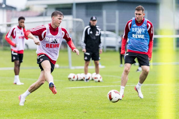 ST. JOHANN IN TIROL, AUSTRIA - JULY 26: Marius Buelter (Bülter, Bulter, 1. FC Koeln, 30) controls the ball against Isak Johannesson (1. FC Koeln, 8) during a training session at trainings camp in Kitzbuehel of season 2026 27 at Koasastadion on July 26, 2026 in St. Johann in Tirol, Austria. Austria Copyright: xSteffiexWunderlx