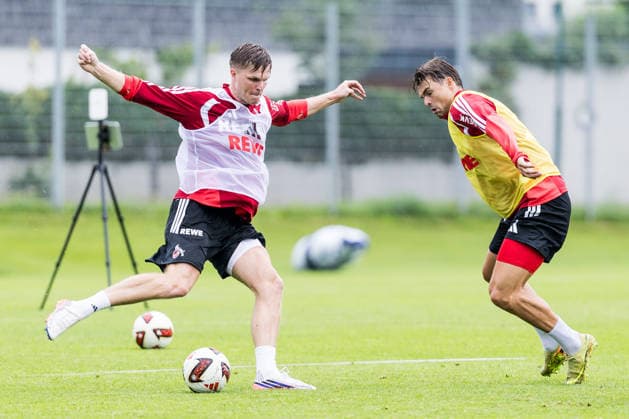 ST. JOHANN IN TIROL, AUSTRIA - JULY 26: Marius Buelter (Bülter, Bulter, 1. FC Koeln, 30) controls the ball against Joel Schmied (1. FC Koeln, 2) during a training session at trainings camp in Kitzbuehel of season 2026 27 at Koasastadion on July 26, 2026 in St. Johann in Tirol, Austria. Austria Copyright: xSteffiexWunderlx