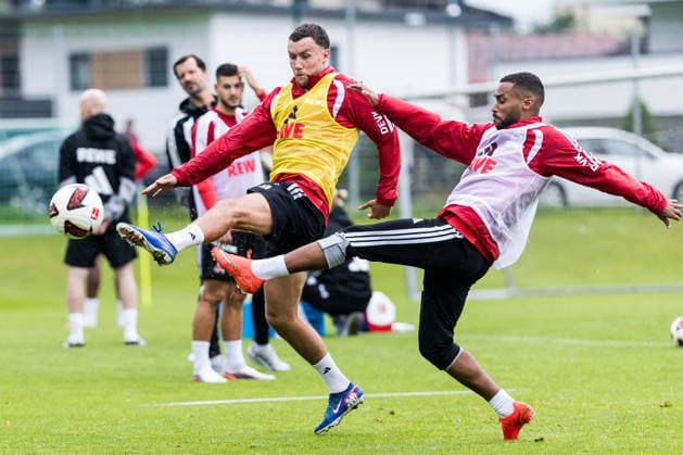 ST. JOHANN IN TIROL, AUSTRIA - JULY 26: Luca Waldschmidt (1. FC Koeln, 7) and Linton Maina (1. FC Koeln, 37) battle for the ball during a training session at trainings camp in Kitzbuehel of season 2026 27 at Koasastadion on July 26, 2026 in St. Johann in Tirol, Austria. Austria Copyright: xSteffiexWunderlx