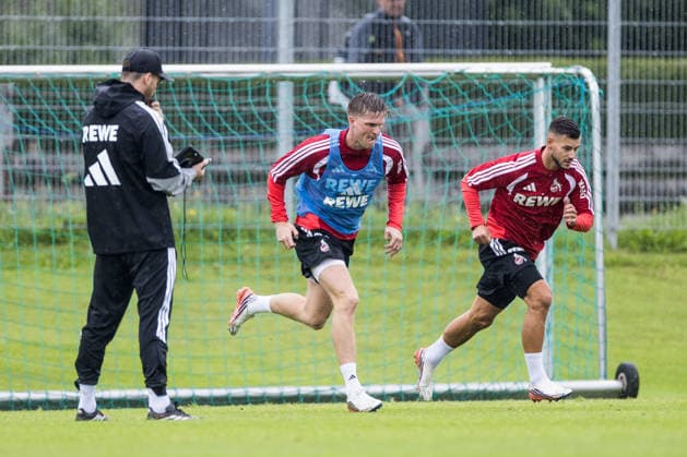 ST. JOHANN IN TIROL, AUSTRIA - JULY 26: Marius Buelter (Bülter, Bulter, 1. FC Koeln, 30), Tom Krauss (Krauß, 1. FC Koeln, 5) running during a training session at trainings camp in Kitzbuehel of season 2026 27 at Koasastadion on July 26, 2026 in St. Johann in Tirol, Austria. Austria Copyright: xSteffiexWunderlx