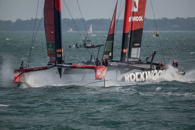 Spain lead by driver Diego Botin and wing trimmer Florian Trittel with Rockwool Denmark led by round the world sailor Nicolai Sehested closing on the final mark during the Emirates GB SailGP at The Solent, Portsmouth, UK on 25 July 2026. Copyright: xPhilxHutchinsonx 45300043