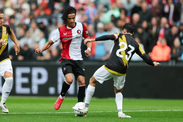 2026-07-26 Feyenoord v Rayo Vallecano - Pre Season Friendly ROTTERDAM, NETHERLANDS - JULY 26: Gjivai Zechiel of Feyenoord battles for the ball with Oscar Valentin Martin of Rayo Vallecano during the Pre Season Friendly match between Feyenoord and Rayo Vallecano at Stadion Feijenoord on July 26, 2026 in Rotterdam, Netherlands. Rotterdam Stadion Feijenoord Netherlands Content not available for redistribution in The Netherlands directly or indirectly through any third parties. Copyright: xHansxvanxderxValkx
