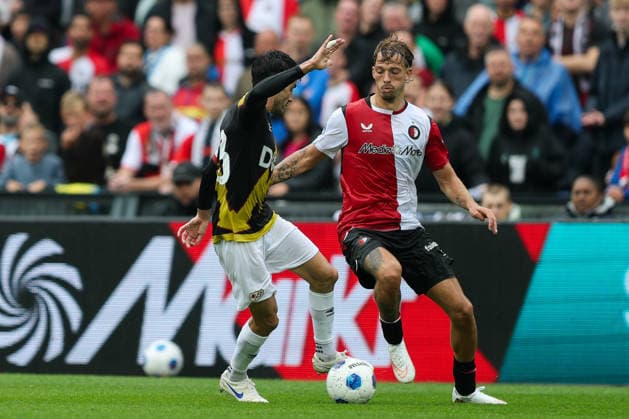 2026-07-26 Feyenoord v Rayo Vallecano - Pre Season Friendly ROTTERDAM, NETHERLANDS - JULY 26: Luciano Valente of Feyenoord is challenged by Oscar Valentin Martin of Rayo Vallecano during the Pre Season Friendly match between Feyenoord and Rayo Vallecano at Stadion Feijenoord on July 26, 2026 in Rotterdam, Netherlands. Rotterdam Stadion Feijenoord Netherlands Content not available for redistribution in The Netherlands directly or indirectly through any third parties. Copyright: xHansxvanxderxValkx