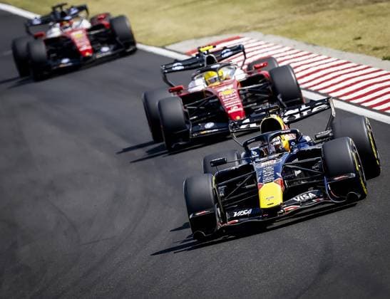 BUDAPEST - Charles Leclerc (Ferrari), Lewis Hamilton (Ferrari) and Max Verstappen (Red Bull Racing) during the race at the Hungaroring for the Hungarian Grand Prix. SANDER KONING ANP xVIxANPxSportx xxANPxIVx 564335330 originalFilename: 564335330.jpg