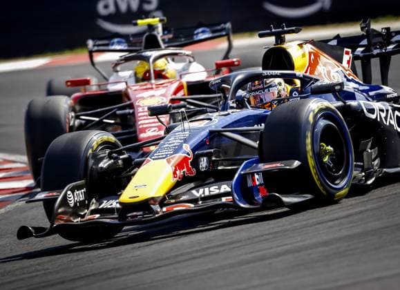 BUDAPEST - Lewis Hamilton (Ferrari) and Max Verstappen (Red Bull Racing) during the race at the Hungaroring for the Hungarian Grand Prix. SANDER KONING ANP xVIxANPxSportx xxANPxIVx 564335513 originalFilename: 564335513.jpg