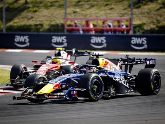 BUDAPEST - Lewis Hamilton (Ferrari) and Max Verstappen (Red Bull Racing) during the race at the Hungaroring for the Hungarian Grand Prix. SANDER KONING ANP xVIxANPxSportx xxANPxIVx 564335517 originalFilename: 564335517.jpg