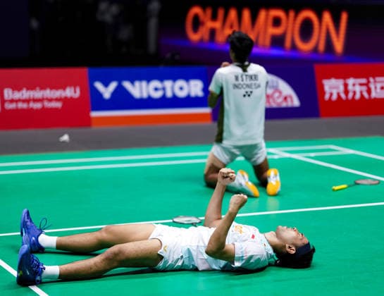 (260726) -- CHANGZHOU, July 26, 2026 -- Fajar Alfian (bottom) Muhammad Shohibul Fikri celebrate victory after winning the men s doubles final match between Fajar Alfian Muhammad Shohibul Fikri of Indonesia and Kim Won Ho Seo Seung Jae of South Korea at the China Open 2026 badminton tournament in Changzhou, east China s Jiangsu Province, July 26, 2026. ) (SP)CHINA-CHANGZHOU-BADMINTON-CHINA OPEN-MEN S DOUBLES-FINAL (CN) SunxFei 