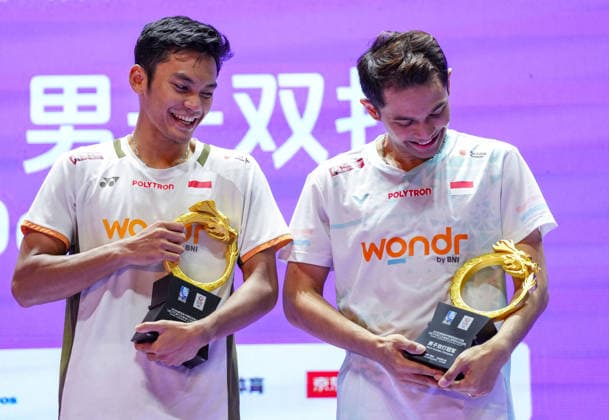 (260726) -- CHANGZHOU, July 26, 2026 -- Fajar Alfian (R) Muhammad Shohibul Fikri react during the victory ceremony after the men s doubles final match between Fajar Alfian Muhammad Shohibul Fikri of Indonesia and Kim Won Ho Seo Seung Jae of South Korea at the China Open 2026 badminton tournament in Changzhou, east China s Jiangsu Province, July 26, 2026. ) (SP)CHINA-CHANGZHOU-BADMINTON-CHINA OPEN-MEN S DOUBLES-FINAL (CN) SunxFei 