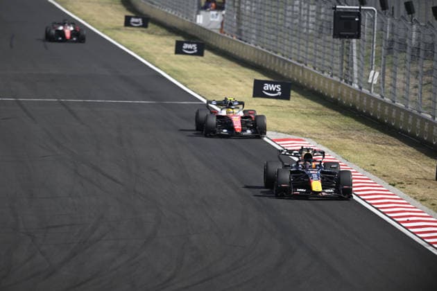 July 26, 2026, Budapest, Budapest, Hungary: Max Verstappen of Red Bull and Lewis Hamilton of Ferrari on track at the Hungaroring circuit during the 2026 Hungarian Grand Prix in Budapest, Hungary on 25 July 2026. Budapest Hungary - ZUMAs291 20260726_zip_s291_012 Copyright: xBalintxSzentgallayx
