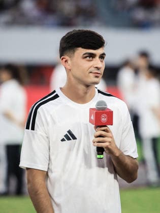 SUZHOU, CHINA - JULY 26: Pedri Gonzalez of Spain and FC Barcelona, Barca greets fans during the kick-off ceremony for the final of the National Youth Campus Football High School League at Suzhou Sports Center on July 26, 2026 in Suzhou, Jiangsu Province of China. The Spanish national team, Nationalteam player and Barcelona midfielder attended the event to interact with players.  Copyright: xVCGx 111656521362