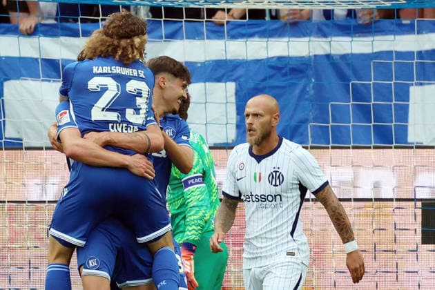 26.07.2026, xrekx, Fussball Testspiel, Karlsruher SC - Inter Mailand v.l. Torjubel nach dem Tor zum celebrating the goal celebrate 1:0 durch Tim Civeja (Karlsruher SC) Federico Dimarco (Inter Mailand) enttaeuscht, enttäuscht, schaut enttaeuscht, niedergeschlagen, disappointed (DFL DFB REGULATIONS PROHIBIT ANY USE OF PHOTOGRAPHS as IMAGE SEQUENCES and or QUASI-VIDEO) Karlsruhe *** July 26, 2026, xrekx, Soccer Friendly Match, Karlsruher SC vs. Inter Milan: Goal celebration after Tim Civeja s goal for Karlsruher SC (1–0) and Federico Dimarco of Inter Milan looks disappointed, dejected, looks disappointed, dejected, disappointed DFL DFB REGULATIONS PROHIBIT ANY USE OF PHOTOGRAPHS as IMAGE SEQUENCES and or QUASI-VIDEO Karlsruhe