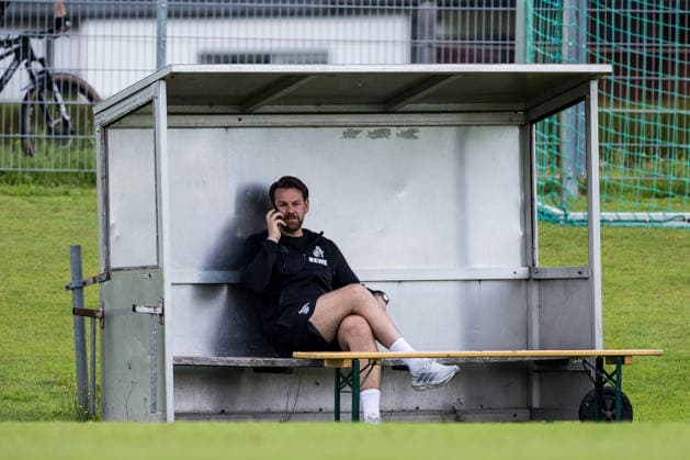 ST. JOHANN IN TIROL, AUSTRIA - JULY 26: Thomas Kessler (Sports Director 1. FC Koeln) on the phone during a training session at trainings camp in Kitzbuehel of season 2026 27 at Koasastadion on July 26, 2026 in St. Johann in Tirol, Austria. Austria Copyright: xSteffiexWunderlx