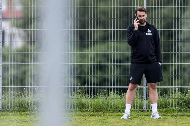 ST. JOHANN IN TIROL, AUSTRIA - JULY 26: Thomas Kessler (Sports Director 1. FC Koeln) on the phone during a training session at trainings camp in Kitzbuehel of season 2026 27 at Koasastadion on July 26, 2026 in St. Johann in Tirol, Austria. Austria Copyright: xSteffiexWunderlx