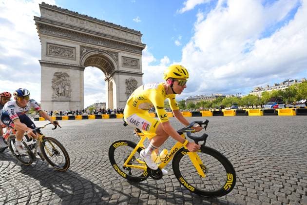 Belgian Remco Evenepoel of Red Bull-BORA-hansgrohe and Slovenian Tadej Pogacar of UAE Team Emirates XRG pictured in action during stage 21 of the 2026 Tour de France cycling race, a stage of 130km from Thoiry to Paris Champs-Elysees , on Sunday 26 July 2026. The 113th edition of the Tour de France starts on Saturday 4 July in Barcelona, Spain, and will finish in Paris, France on the 26th of July. DAVIDxPINTENS  x182100147x