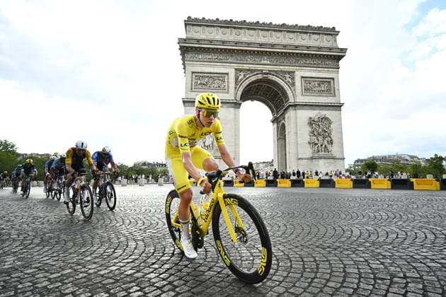 Slovenian Tadej Pogacar of UAE Team Emirates XRG and pictured in front of Arc De Triomphe during stage 21 of the 2026 Tour de France cycling race, a stage of 130km from Thoiry to Paris Champs-Elysees , on Sunday 26 July 2026. The 113th edition of the Tour de France starts on Saturday 4 July in Barcelona, Spain, and will finish in Paris, France on the 26th of July. JASPERxJACOBS  x182103169x