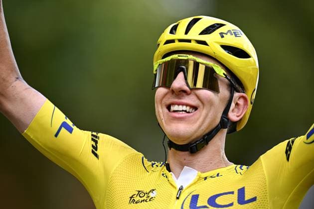 Slovenian Tadej Pogacar of UAE Team Emirates-XRG celebrates as he crosses the finish line of stage 21 of the 2026 Tour de France cycling race, a stage of 130km from Thoiry to Paris Champs-Elysees , on Sunday 26 July 2026. The 113th edition of the Tour de France starts on Saturday 4 July in Barcelona, Spain, and will finish in Paris, France on the 26th of July. JASPERxJACOBS  x182104632x