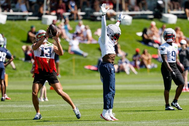FOXBOROUGH, MA - JULY 26: A.J. Brown 1 of the New England Patriots plays defensive back as Mack Hollins 13 of the New England Patriots hauls in a pass during New England Patriots Training Camp on July 26, 2026, at Gillette Stadium in Foxborough, Massachusetts. (Photo by Fred Kfoury III Icon Sportswire) NFL, American Football Herren, USA JUL 26 Patriots Training Camp EDITORIAL USE ONLY Icon482260726009