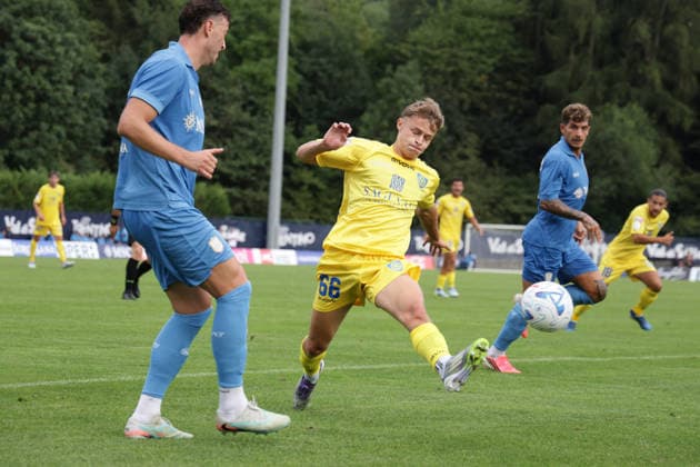 SOCCER - Friendly Match - Napoli vs. Carrarese Photo by IPA ABACAPRESS.COM87021774 - Napoli s Kosovar defender Amir Rrahmani battles for the ball with Pietro Pinelli during the friendly match between SSC Napoli and Carrarese. SSC Napoli s 2026-27 preseason training camp in Val di Sole, Trentino, Dimaro Folgarida, July 26, 2026. Dimaro Italy  Copyright: xIPAxSport ABACAx