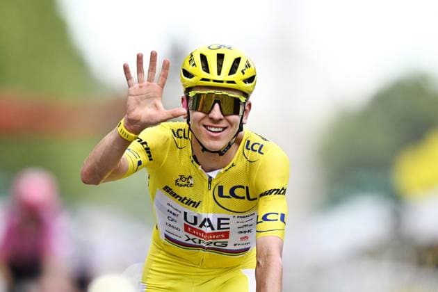 Slovenian Tadej Pogacar of UAE Team Emirates-XRG celebrates as he crosses the finish line at stage 21 of the 2026 Tour de France cycling race, a stage of 130km from Thoiry to Paris Champs-Elysees , on Sunday 26 July 2026. The 113th edition of the Tour de France starts on Saturday 4 July in Barcelona, Spain, and will finish in Paris, France on the 26th of July. JASPERxJACOBS  x182107488x