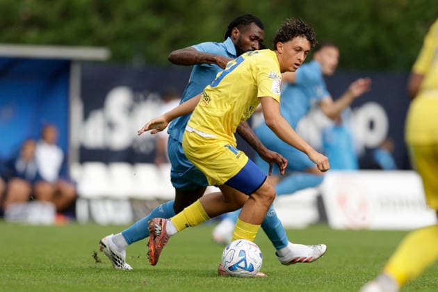 SOCCER - Friendly Match - Napoli vs. Carrarese Photo by IPA ABACAPRESS.COM87021806 - Napoli s Cameroonian midfielder Andre Frank Zambo Anguissa battles for the ball with Yanis Khafi during a friendly match between SSC Napoli and Carrarese at SSC Napoli s 2026-27 preseason training camp in Val di Sole, Trentino, Dimaro Folgarida, on July 26, 2026. Dimaro Italy  Copyright: xIPAxSport ABACAx