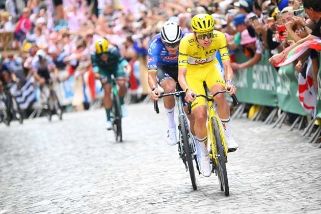 Dutch Mathieu van der Poel of Alpecin-Premier Tech and Slovenian Tadej Pogacar of UAE Team Emirates XRG are pictured in action during stage 21 of the 2026 Tour de France cycling race, a stage of 130km from Thoiry to Paris Champs-Elysees , on Sunday 26 July 2026. The 113th edition of the Tour de France starts on Saturday 4 July in Barcelona, Spain, and will finish in Paris, France on the 26th of July. POOLxLUCAxBETTINI  x182108096x