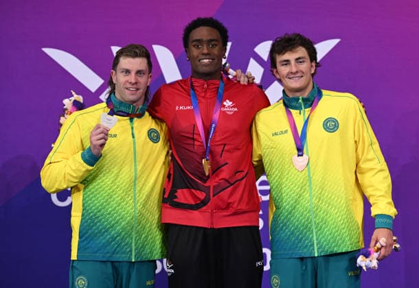 COM26 SWIMMING FINALS, Matthew Temple of Australia, Joshua Liendo of Canadaand Ben Armbruster pose following the Men™s 100m Butterfly Final at the Glasgow 2026 Commonwealth Games at the Tollcross International Swimming Centre in Glasgow, Scotland, Sunday, July 26, 2026. ( NO ARCHIVING, EDITORIAL USE ONLY Glasgow Scotland United Kingdom  Copyright: xDEANxLEWINSx 20260727153344338528
