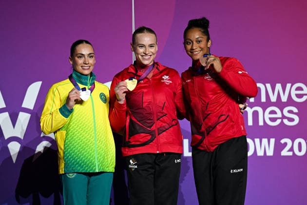 COM26 ARTISTIC GYMNASTICS, Gold medallist Elsabeth Black of Canada, Silver medallist Breanna Scott of Australia and Lia-Monica Fontaine of Canada on the podium in the Artistic Gymnastics Women™s All-Around Final during the Glasgow 2026 Commonwealth Games at the Glasgow International Arena in Glasgow, Scotland, Sunday, July 26, 2026. ( NO ARCHIVING, EDITORIAL USE ONLY Glasgow Scotland United Kingdom  Copyright: xLUKASxCOCHx 20260727117119575060