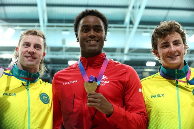 July 26, 2026, Glasgow, Scotland, Great Britain: JOSHUA LIENDO of Canada (center), MATTHEW TEMPLE of Australia (left) and BEN ARMBRUSTER of Australia (right) pose with their gold, silver and bronze medal in the Swimming Men s 100m Butterfly Medal Ceremony of the Commonwealth Games Glasgow 2026 at the Tollcross International Swimming Centre in Glasgow, Scotland. Commowealth Games 2026: Swimming  - ZUMAc179 20260726_zep_c179_316 Copyright: xMickaelxChavetx