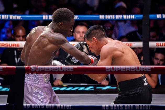 July 26, 2026, New York, New York, USA: RICHARDSON HITCHINS (purple trunks) battles RICARDO SALAS in a welterweight bout at Madison Square Garden in New York, New York. New York USA - ZUMAp109 20260726_zaf_p109_006 Copyright: xJoelxPlummerx