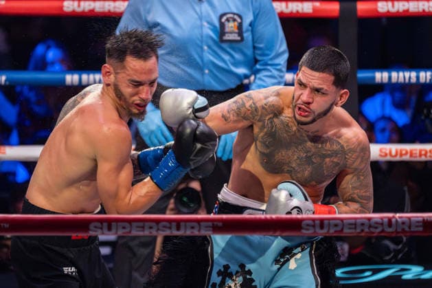 July 26, 2026, New York, New York, USA: EDGAR BERLANGA (teal trunks) battles STEVEN BUTLER in a super middleweight bout at Madison Square Garden in New York, New York. New York USA - ZUMAp109 20260726_zaf_p109_023 Copyright: xJoelxPlummerx