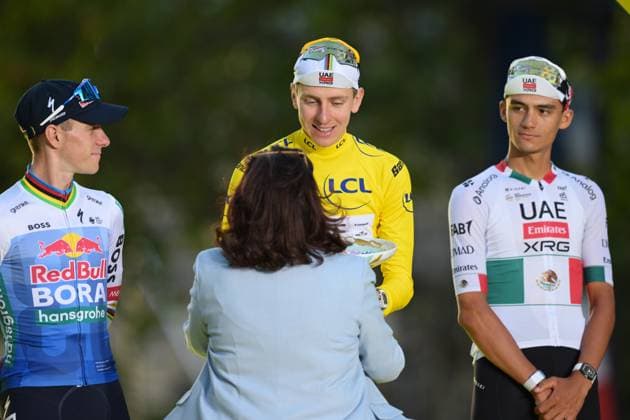 Belgian Remco Evenepoel of Red Bull-BORA-hansgrohe, Slovenian Tadej Pogacar of UAE Team Emirates XRG and Mexican Isaac Del Toro of UAE Team Emirates XRG pictured on the podium after stage 21 of the 2026 Tour de France cycling race, a stage of 130km from Thoiry to Paris Champs-Elysees , on Sunday 26 July 2026. The 113th edition of the Tour de France starts on Saturday 4 July in Barcelona, Spain, and will finish in Paris, France on the 26th of July. DAVIDxPINTENS  x182130352x