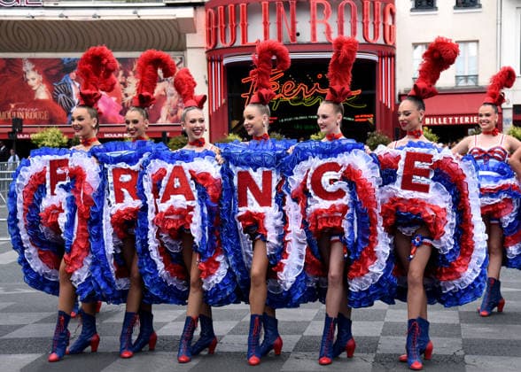 Tour De France In Front Of The Moulin Rouge - Paris French Cancan wild to welcome the passage of the Tour de France in front of the Moulin Rouge in Paris, France on July 26, 2026. Photo by Alain Apaydin ABACAPRESS.COM Paris France  Copyright: xApaydinxAlain ABACAx