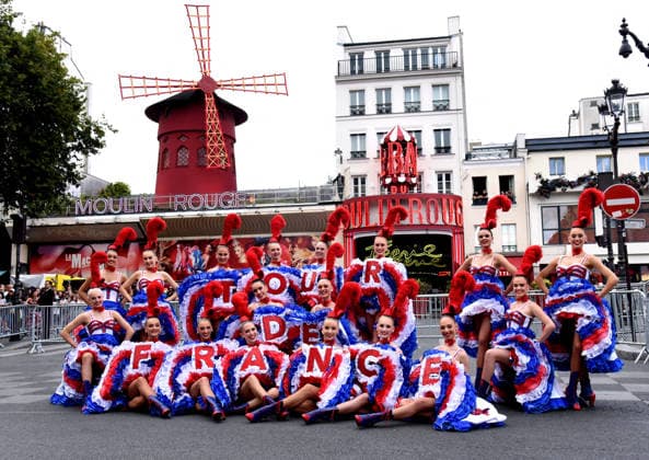 Tour De France In Front Of The Moulin Rouge - Paris French Cancan wild to welcome the passage of the Tour de France in front of the Moulin Rouge in Paris, France on July 26, 2026. Photo by Alain Apaydin ABACAPRESS.COM Paris France  Copyright: xApaydinxAlain ABACAx