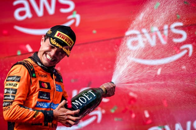 (260727) -- MOGYOROD, July 27, 2026 -- McLaren s Lando Norris of Britain celebrates during the awarding ceremony after the Formula One Hungarian Grand Prix at the Hungaroring in Mogyorod, near Budapest, Hungary, July 26, 2026. (Photo by Xinhua) (SP)HUNGARY-MOGYOROD-F1-HUNGARIAN GRAND PRIX-RACE DavidxBalogh 