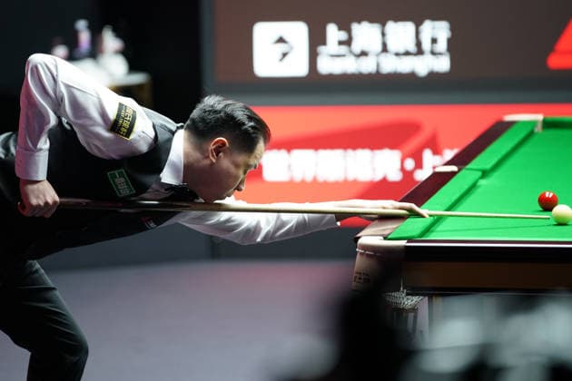 SHANGHAI, CHINA - JULY 27: Xiao Guodong of China plays a shot in the first round match against Xu Jiarui of China on day 1 of the Shanghai Masters 2026 at Luwan Gymnasium on July 27, 2026 in Shanghai, China.  Copyright: xTaixChengzhex 111656640120