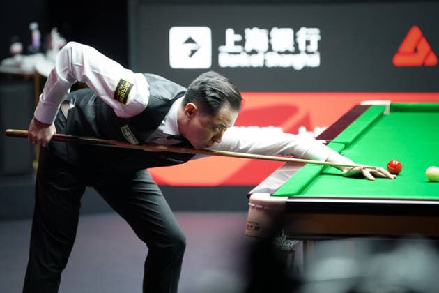 SHANGHAI, CHINA - JULY 27: Xiao Guodong of China plays a shot in the first round match against Xu Jiarui of China on day 1 of the Shanghai Masters 2026 at Luwan Gymnasium on July 27, 2026 in Shanghai, China.  Copyright: xTaixChengzhex 111656640123