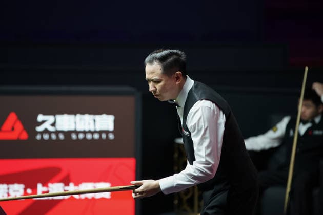 SHANGHAI, CHINA - JULY 27: Xiao Guodong of China plays a shot in the first round match against Xu Jiarui of China on day 1 of the Shanghai Masters 2026 at Luwan Gymnasium on July 27, 2026 in Shanghai, China.  Copyright: xTaixChengzhex 111656640114