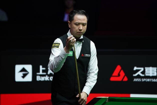 SHANGHAI, CHINA - JULY 27: Xiao Guodong of China chalks the cue in the first round match against Xu Jiarui of China on day 1 of the Shanghai Masters 2026 at Luwan Gymnasium on July 27, 2026 in Shanghai, China.  Copyright: xTaixChengzhex 111656640115
