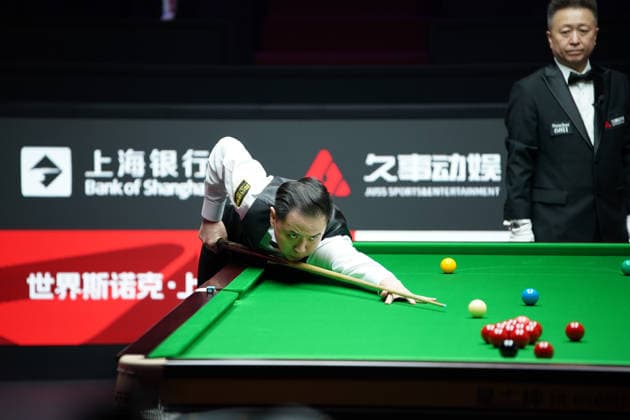 SHANGHAI, CHINA - JULY 27: Xiao Guodong of China plays a shot in the first round match against Xu Jiarui of China on day 1 of the Shanghai Masters 2026 at Luwan Gymnasium on July 27, 2026 in Shanghai, China.  Copyright: xTaixChengzhex 111656640116