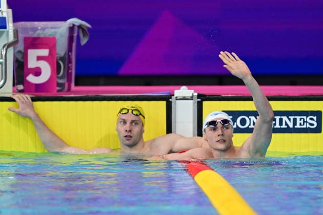 COM26 SWIMMING HEATS, Matthew Temple of Australia and Duncan Scott of England during the Men™s 200m Butterfly heats at the Glasgow 2026 Commonwealth Games at the Tollcross International Swimming Centre in Glasgow, Scotland, Monday, July 27, 2026. ( NO ARCHIVING, EDITORIAL USE ONLY Glasgow Scotland United Kingdom  Copyright: xDEANxLEWINSx 20260727132262624284