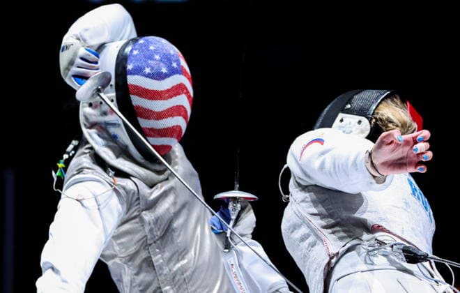 CHINA, HONG KONG - JULY 27, 2026: Lauren Scruggs of the United States (L) and Russia s Anna Solovyova compete in the ladies individual foil event at the 2026 Kerry Fencing World Championships. Mikhail Sinitsyn TASS  95532312