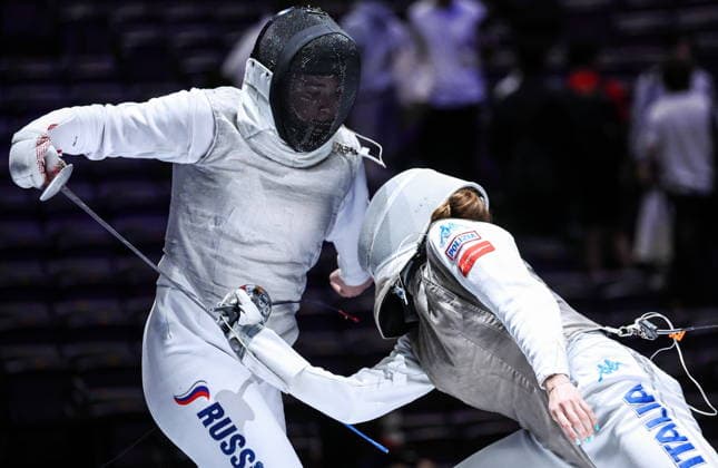 CHINA, HONG KONG - JULY 27, 2026: Russia s Ayla Mamedova (L) and Poland s Marta Jakubowska compete in the ladies individual foil event at the 2026 Kerry Fencing World Championships 2026 Fencing World Championships In Hong Kong  - ZUMAt113 20260727_zaa_t113_074 Copyright: xMikhailxSinitsynx