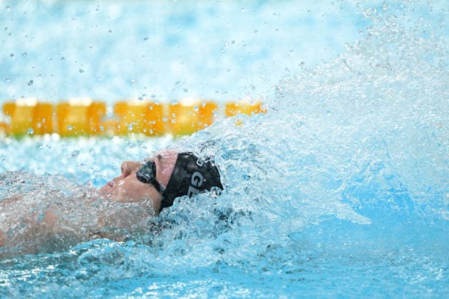 COM26 SWIMMING HEATS, Amber George of New Zealand during the Women™s 50m Backstroke heats at the Glasgow 2026 Commonwealth Games at the Tollcross International Swimming Centre in Glasgow, Scotland, Monday, July 27, 2026. ( NO ARCHIVING, EDITORIAL USE ONLY Glasgow Scotland United Kingdom  Copyright: xDEANxLEWINSx 20260727135961365380