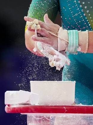 Georgia Godwin of Australia rubs chalk on her hands before performing on the uneven bars during the first rotation of the Artistic Gymnastics Women s All-Around Final. Glasgow 2026 Commonwealth Games, Day Four, Glasgow, Scotland, UK - 26 Jul 2026Glasgow Scotland United Kingdom  Copyright: xStuartxWallace Shutterstockx 17005518by